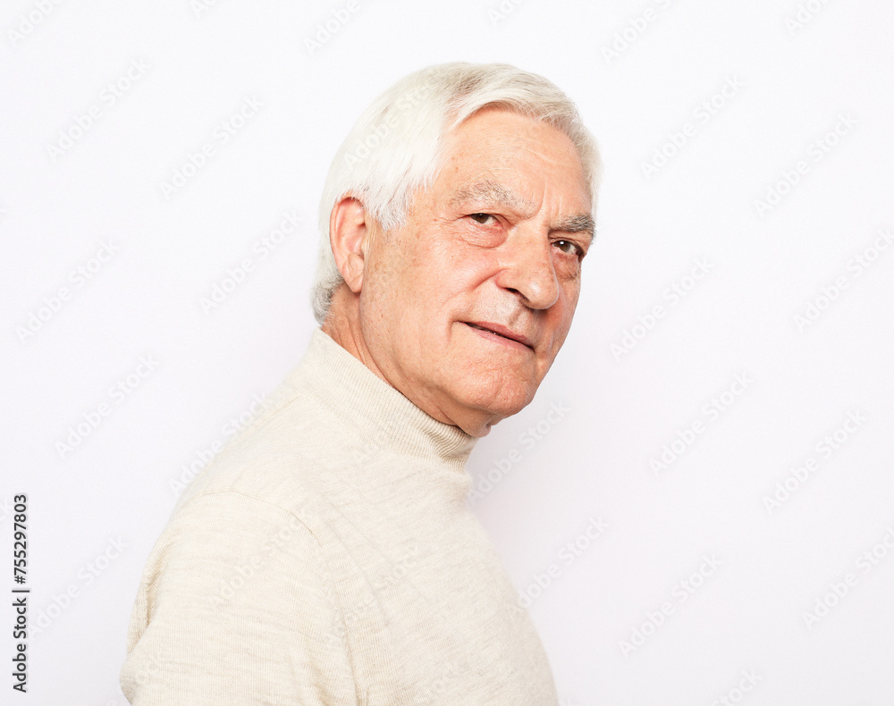 lifestyle, emotion and old people concept: portrait of happy senior man over white background