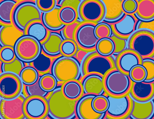 Background of numerous concentric circles in various sizes in the trippy-dippy psychedelic colors of the 60s and 70s.