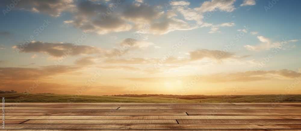 A wooden floor is shown with a clear blue sky in the background, creating a stark contrast between man-made flooring and natural elements. The clear blue sky provides a sense of openness and