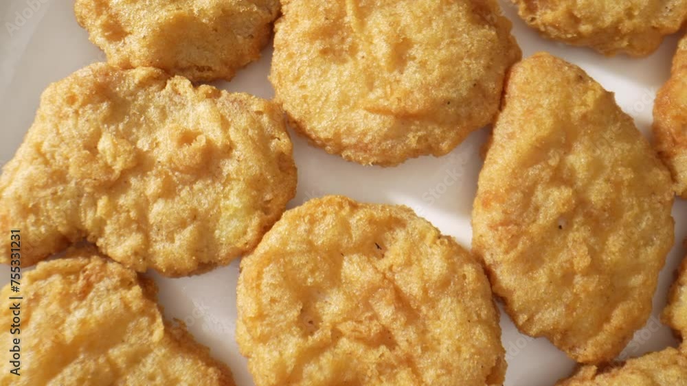 Chicken nuggets served with dipping sauces like ketchup, barbecue, honey mustard, or ranch. Enjoyed alone, in combos at fast-food spots, or in salads and wraps. Fast-food background. 4K HDR.
Chicken nuggets served with dipping sauces like ketchup, barbecue, honey mustard, or ranch. Enjoyed alone, in combos at fast-food spots, or in salads and wraps. Fast-food background. 4K HDR.