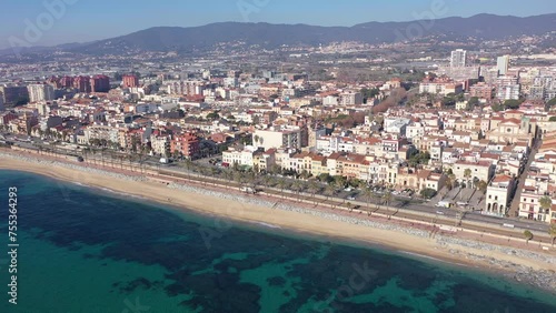 Aerial view of residential areas and the coast of the small Catalan town of Vilasar de Mar, Spain. photo