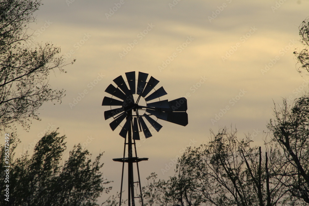 windmill at sunset in Kansas