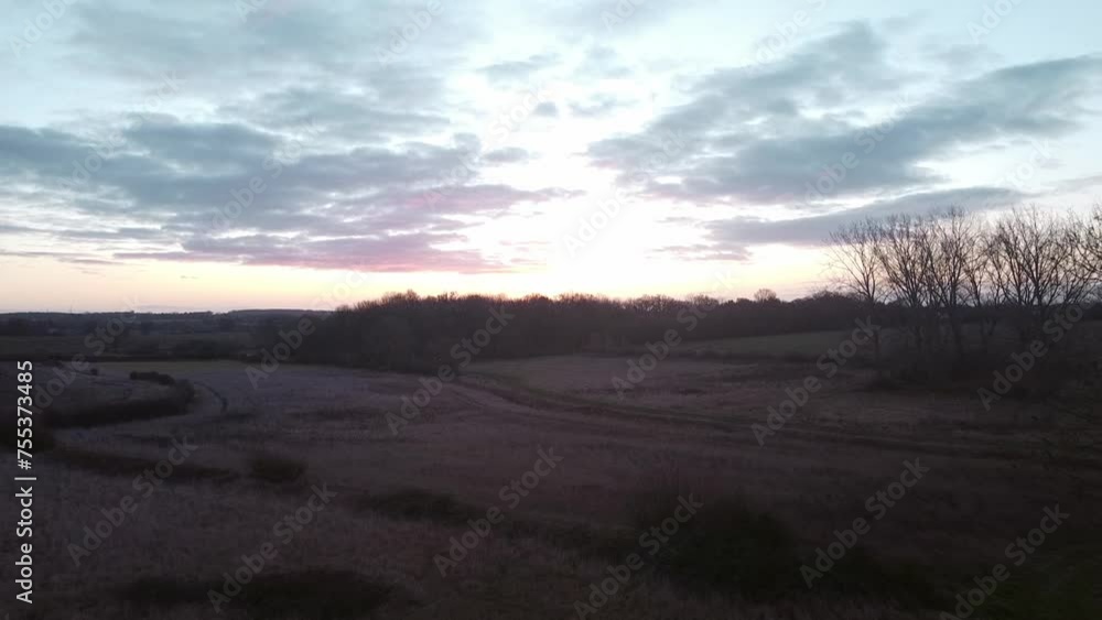 Sunrise over cabin in remote English countryside Sunrise over cabin in remote English countryside