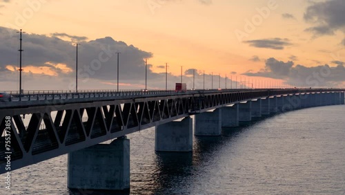 Wallpaper Mural Vibrant sunset sky with traffic moving over iconic Oresund bridge. Aerial riser Torontodigital.ca