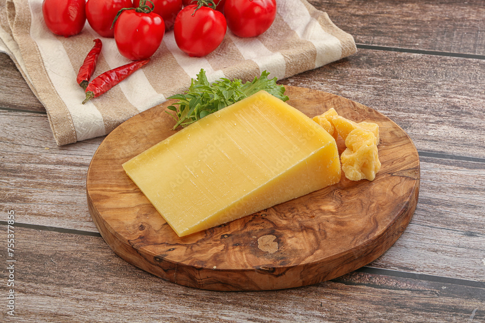 Parmesan hard cheese with small pieces Parmesan hard cheese with small pieces