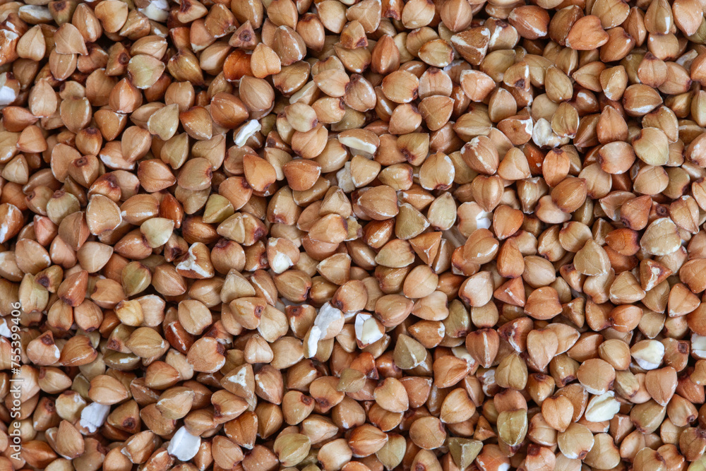 De hulled buckwheat close-up, full frame background or texture De hulled buckwheat close-up, full frame background or texture