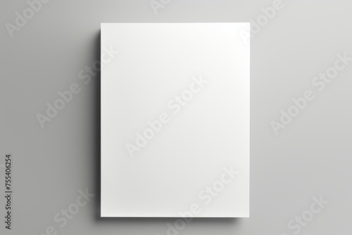 Blank white paper hanging on a wall. Suitable for office or educational concepts
