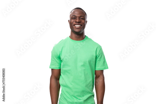 portrait of young handsome american man in green t-shirt and jeans
