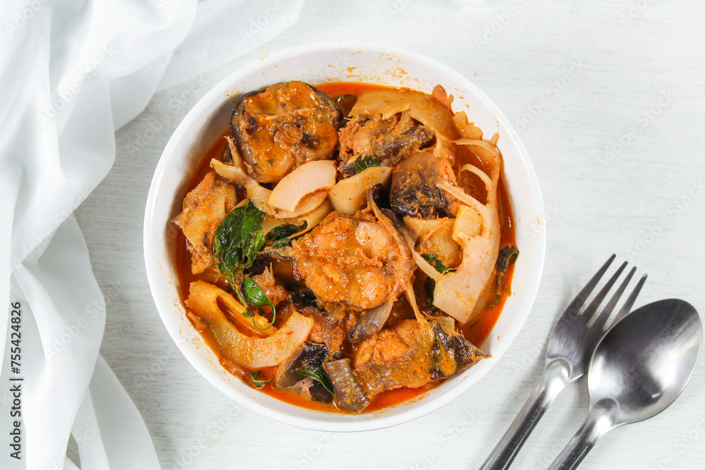 Red curry with catfish and preserved bamboo shoot, Red curry with coconut milk, Thailand tradition red curry soup. Red curry with catfish and preserved bamboo shoot, Red curry with coconut milk, Thailand tradition red curry soup.