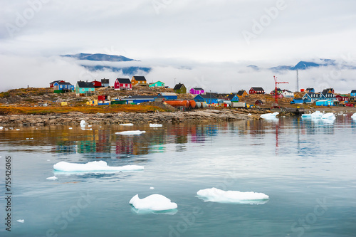 Western Greenland. Colorful houses in Saqqaq village, coast of Atlantic ocean.