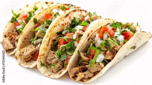 a group of tacos with meat and vegetables