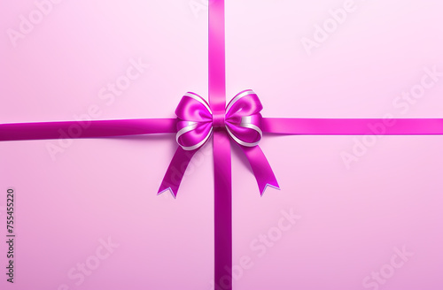 Pink bow on a gift close-up, wallpaper background, splash screen for Holiday or Present Package Design.