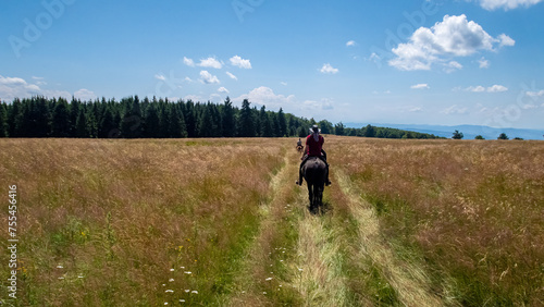 Horseback riding in the carpathian landscape