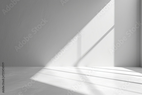 a simple monochrome background of a white floor with a light coming from the wall