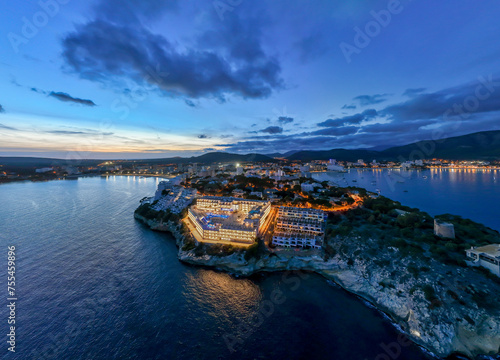 Spain, Balearic Islands, Magaluf, Aerial view of bay of Majorca at dusk photo