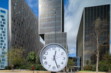 clock with time passing during in city skyline