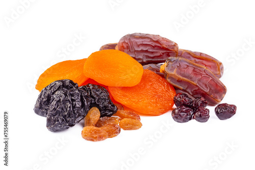 Fototapeta Naklejka Na Ścianę i Meble -  Dried fruits on a white background. Dried dates, grapes and apricots.