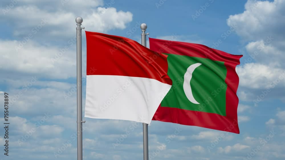 Maldives and Indonesia two flags waving together, looped video, two country relations concept Maldives and Indonesia two flags waving together, looped video, two country relations concept