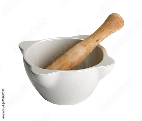 White mortar and wooden pestle isolated on white photo