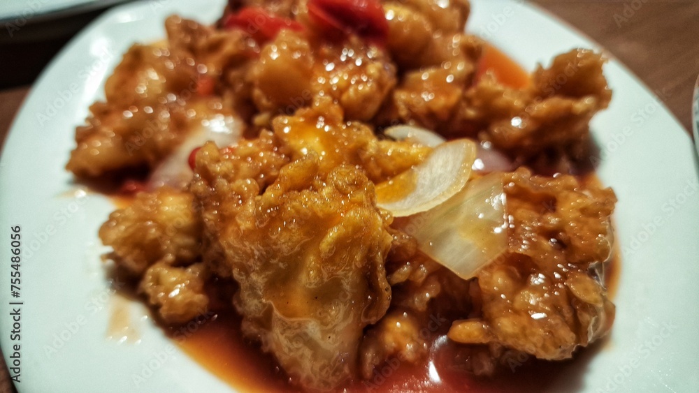 Indonesian style sweet and sour squid dish Indonesian style sweet and sour squid dish