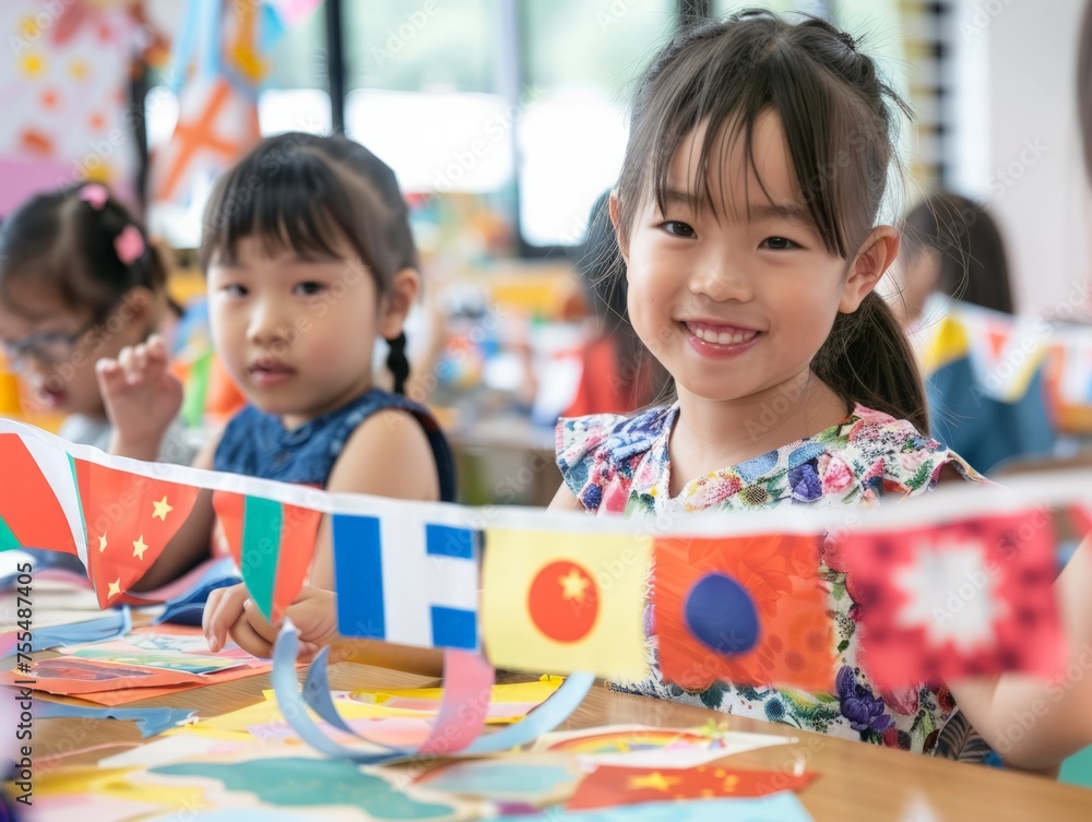 Asian Chinese happy children girl of five years old make flags from paper at a master class. concept of patriotism, school, happiness, team, class, children Asian Chinese happy children girl of five years old make flags from paper at a master class. concept of patriotism, school, happiness, team, class, children