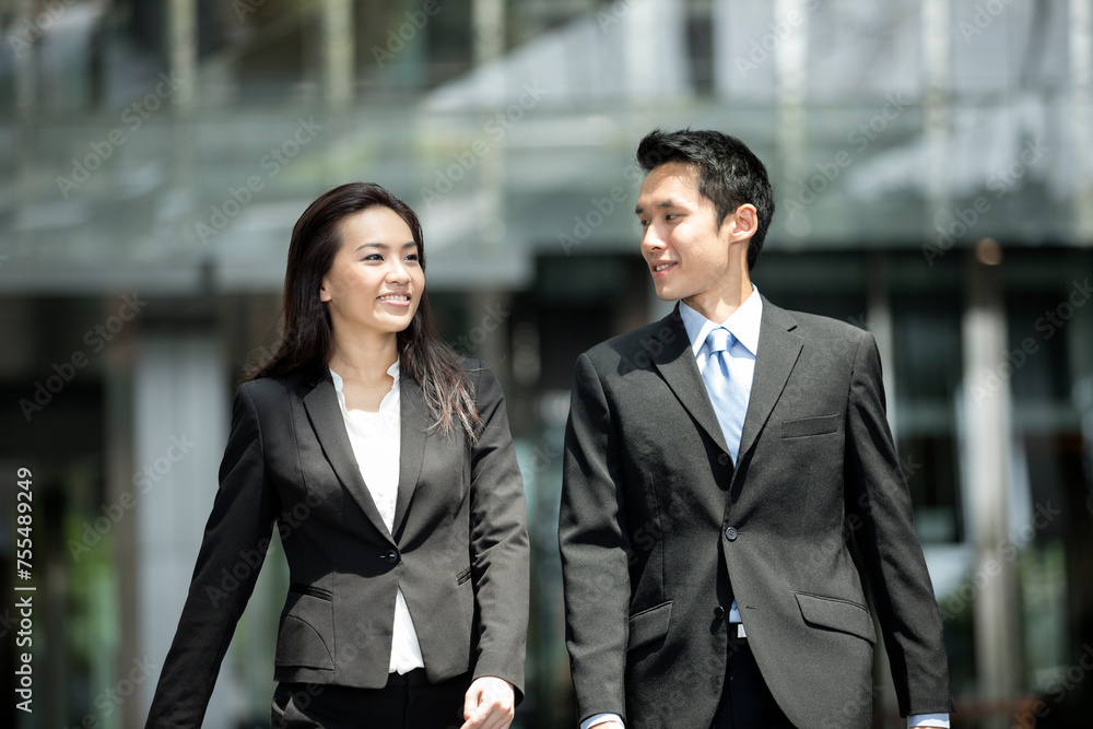 Happy Asian Business people talking to each other. Happy Asian Business people talking to each other.