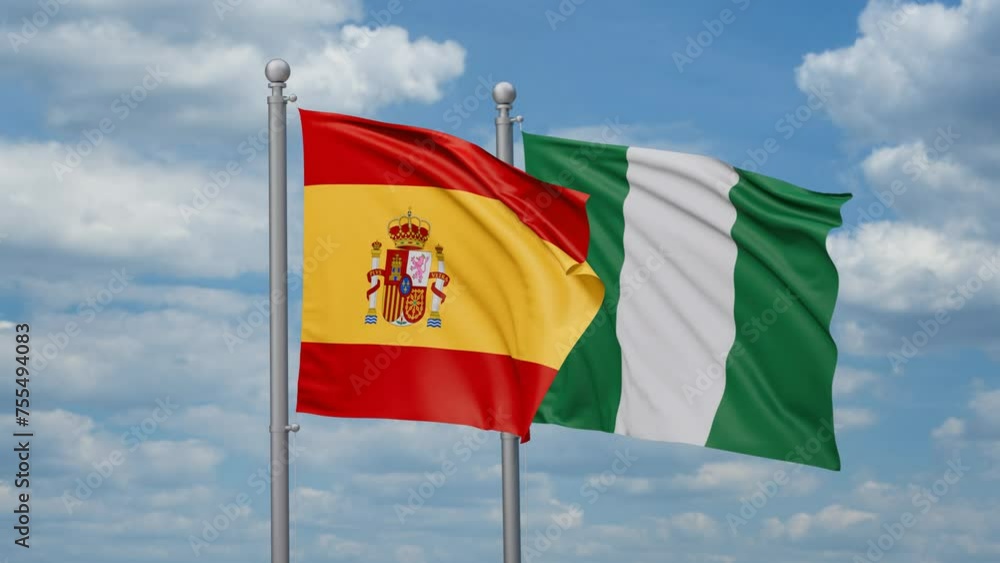 Nigeria and Spain two flags waving together, looped video, two country relations concept Nigeria and Spain two flags waving together, looped video, two country relations concept