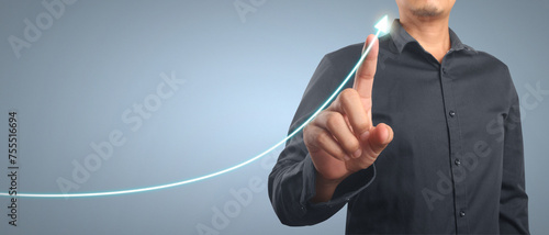 Businessman plan graph growth and increase of chart positive indicators in his business