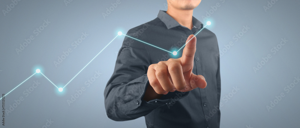 Businessman plan graph growth and increase of chart positive indicators in his business Businessman plan graph growth and increase of chart positive indicators in his business