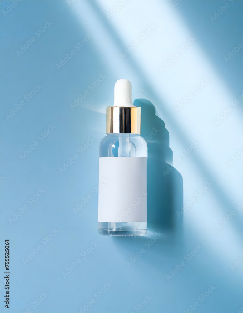 Bottle Skincare serum isolate on blue background Bottle Skincare serum isolate on blue background
