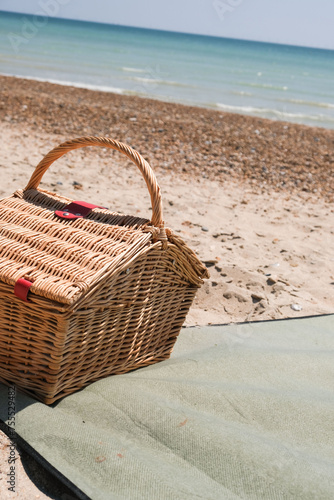 A picnic basket on the beach