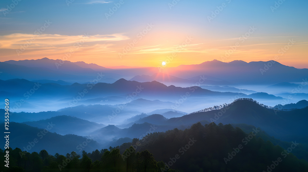 serene sunrise over a misty mountain range