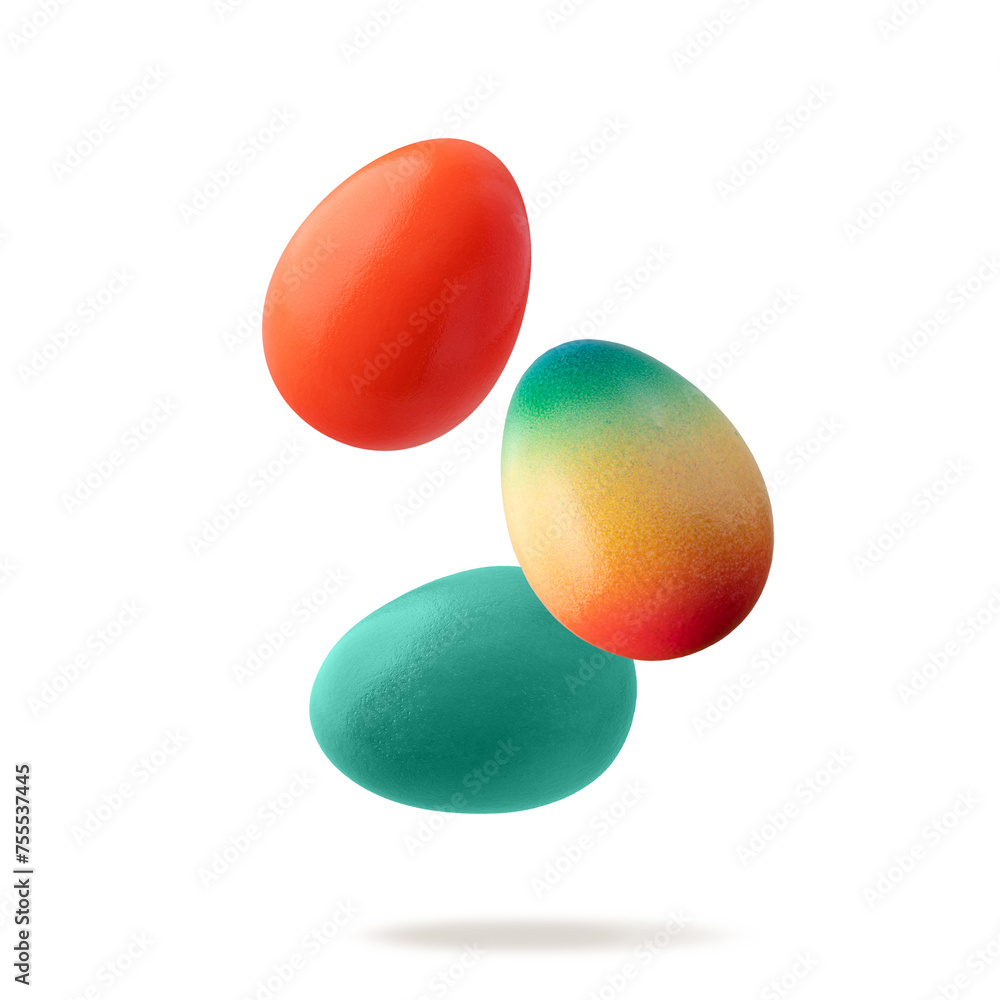Painted natural easter chicken eggs flying isolated on white background. Three colorful festive eggs closeup. Happy Easter card or decoration.