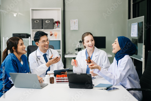 Modern Medical Research Laboratory Portrait of Team Scientists Working, Using Digital Tablet, Analyzing Samples, Talking. for Medicine, Biotechnology Development.