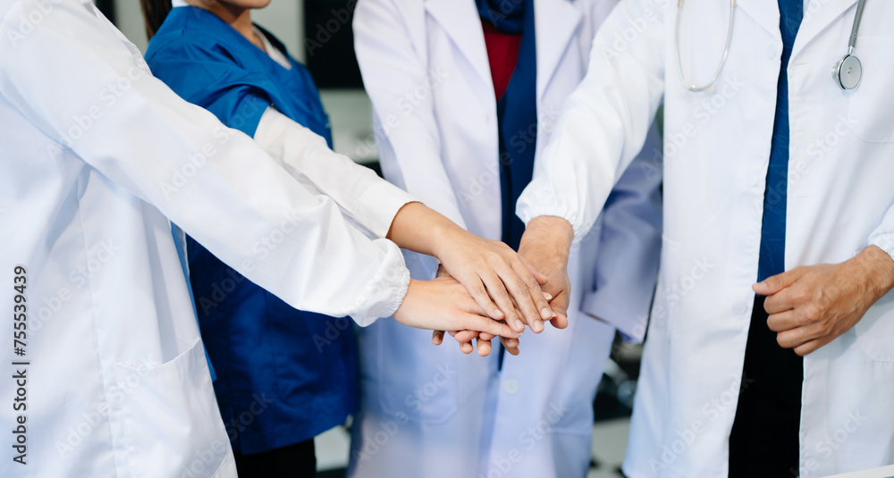 Team Doctors nurses union coordinate hands Teamwork Concept in hospital for success and trust in the team. .. Team Doctors nurses union coordinate hands Teamwork Concept in hospital for success and trust in the team. ..