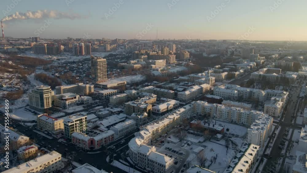 Aerial view of the city of Cheboksary, Russia 2021. Landscape of the city of Cheboksary. Colorful winter sunset scene with pink purple sky. Aerial view of the city of Cheboksary, Russia 2021. Landscape of the city of Cheboksary. Colorful winter sunset scene with pink purple sky.