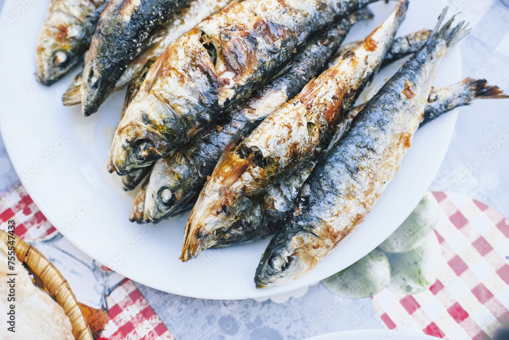 A plate of grilled sardines on a Lisbon festival in June A plate of grilled sardines on a Lisbon festival in June