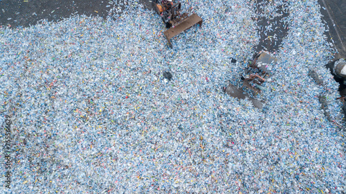 Aerial view plenty of plastic bottles, Waste plastic bottles other types of plastic waste at the waste disposal site, plastic bottles at the factory for processing and recycling PET recycling plant.