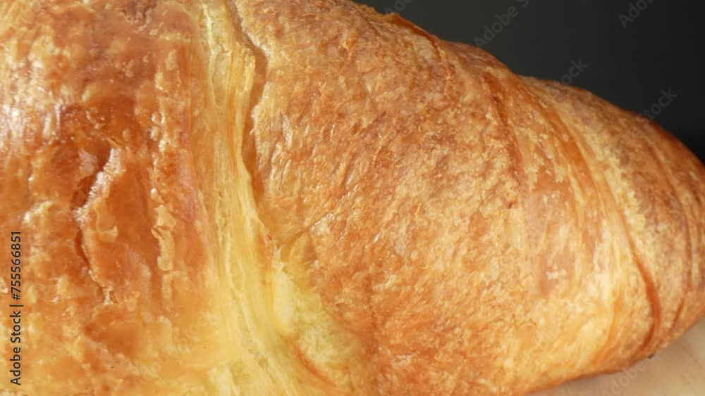 Croissants are made with butter, which is high in saturated fats. Consuming foods high in saturated fats has been linked to an increased risk of heart disease and other health issues. Food background. Croissants are made with butter, which is high in saturated fats. Consuming foods high in saturated fats has been linked to an increased risk of heart disease and other health issues. Food background.