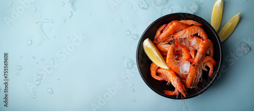 Defrosted shrimps in a bowl. Sea and ocean iced fish. Fish supermarket concept
