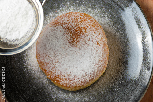 Donut with powdered sugar