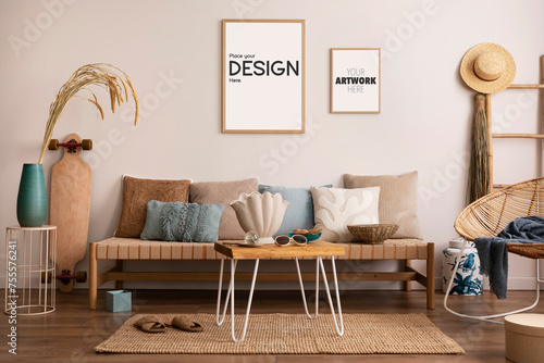 Summer composition of living room interior with couch, pillow carpet, coffee table, armchair and personal accessories. Gray concrete wall. Mock up poster. Template. photo