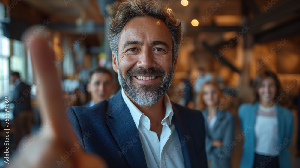 close up of mature businessman holding finger at camera close up of mature businessman holding finger at camera