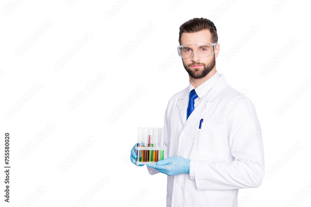 Portrait with copy space, empty place of attractive stylish scientist with bristle in white lab coat, tie holding test tubes with multi-colored liquid, looking at camera over grey background Portrait with copy space, empty place of attractive stylish scientist with bristle in white lab coat, tie holding test tubes with multi-colored liquid, looking at camera over grey background