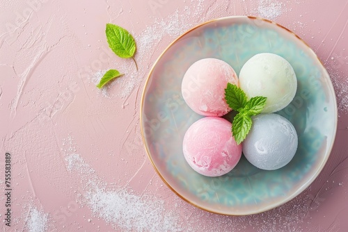 An artistic plate of mochi ice cream in pastel colors