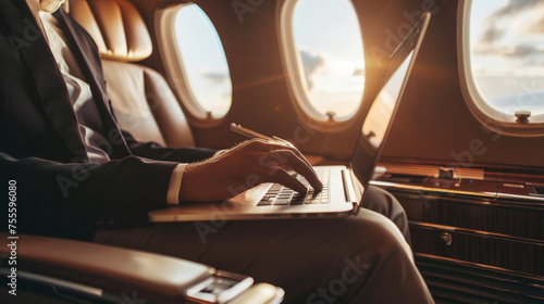 Young businessman in a business suit works on a laptop in a private jet during a business trip. Generative AI