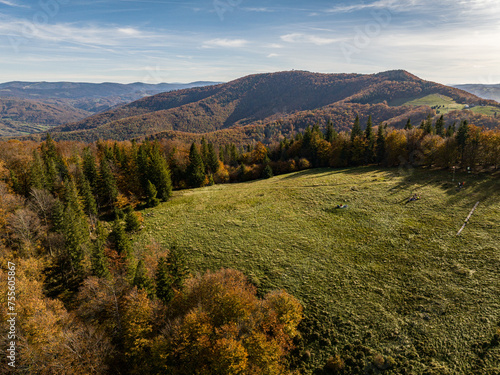 Fototapeta Naklejka Na Ścianę i Meble -  Polish hill mountains beskidy. Autumn i beskid mountains. Wielka Czantoria and Mala Czantoria hill in Beskid Slaski mountains in Poland. Beskid mountains during late autumn day with clear sky.
