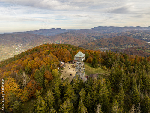 Fototapeta Naklejka Na Ścianę i Meble -  Polish hill mountains beskidy. Autumn i beskid mountains. Wielka Czantoria and Mala Czantoria hill in Beskid Slaski mountains in Poland. Observation tower in the mountains during late autumn day.