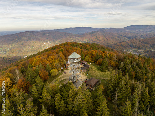 Polish hill mountains beskidy. Autumn i beskid mountains. Wielka Czantoria and Mala Czantoria hill in Beskid Slaski mountains in Poland. Observation tower in the mountains during late autumn day. © Chawran
