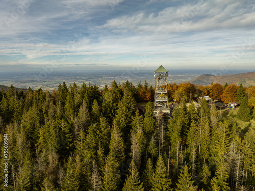 Fototapeta Naklejka Na Ścianę i Meble -  Polish hill mountains beskidy. Autumn i beskid mountains. Wielka Czantoria and Mala Czantoria hill in Beskid Slaski mountains in Poland. Observation tower in the mountains during late autumn day.